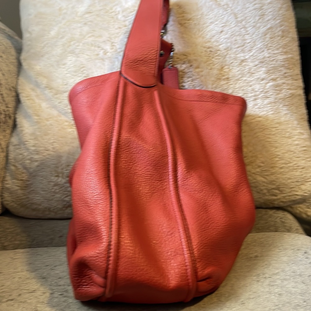 Coral large coach hobo purse with silver hardware.  Coral trim inside to match - Picture 4 of 4